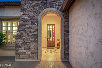 Classy Treviso home presenting curb appeal that makes you want on Tuscany Falls At Pebble Creek in Arizona - for sale on GolfHomes.com, golf home, golf lot