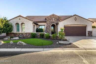 Classy Treviso home presenting curb appeal that makes you want on Tuscany Falls At Pebble Creek in Arizona - for sale on GolfHomes.com, golf home, golf lot
