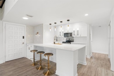 One or more photo(s) has been virtually staged. Discover the on Pasadena Yacht and Country Club in Florida - for sale on GolfHomes.com, golf home, golf lot