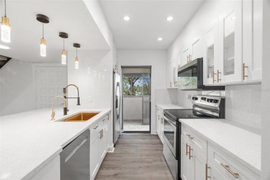 One or more photo(s) has been virtually staged. Discover the on Pasadena Yacht and Country Club in Florida - for sale on GolfHomes.com, golf home, golf lot