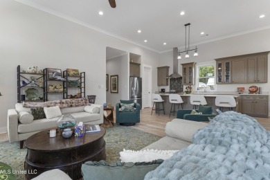 Located in the highly sought-after golf cart district of on Gulf Hills Golf Club in Mississippi - for sale on GolfHomes.com, golf home, golf lot