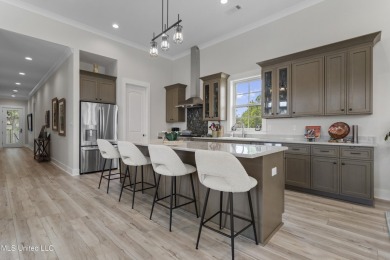 Located in the highly sought-after golf cart district of on Gulf Hills Golf Club in Mississippi - for sale on GolfHomes.com, golf home, golf lot
