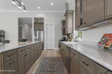Located in the highly sought-after golf cart district of on Gulf Hills Golf Club in Mississippi - for sale on GolfHomes.com, golf home, golf lot