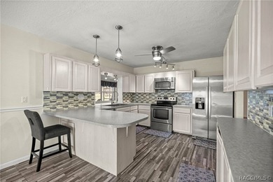 NEVER FLOODED and located directly on the PLANTATION GOLF COURSE on Plantation Inn and Golf Resort  in Florida - for sale on GolfHomes.com, golf home, golf lot