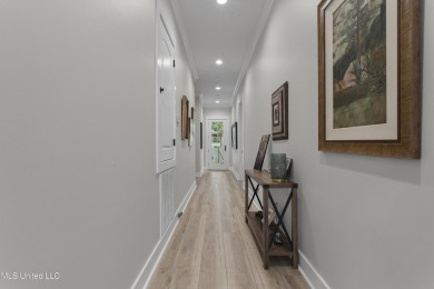 Located in the highly sought-after golf cart district of on Gulf Hills Golf Club in Mississippi - for sale on GolfHomes.com, golf home, golf lot