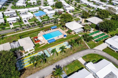 BACK ON MARKET - CASH ONLY! Roof age requires cash purchase on Leisureville Community Golf Course in Florida - for sale on GolfHomes.com, golf home, golf lot