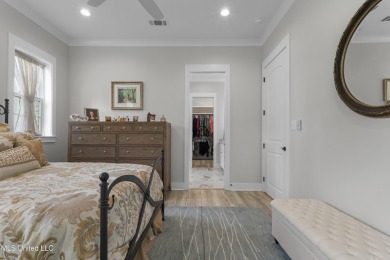 Located in the highly sought-after golf cart district of on Gulf Hills Golf Club in Mississippi - for sale on GolfHomes.com, golf home, golf lot