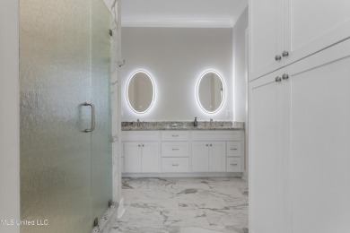 Located in the highly sought-after golf cart district of on Gulf Hills Golf Club in Mississippi - for sale on GolfHomes.com, golf home, golf lot