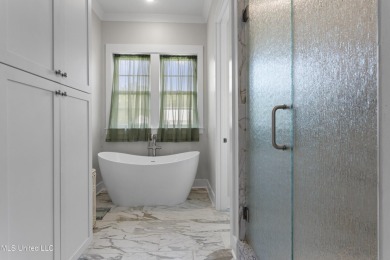 Located in the highly sought-after golf cart district of on Gulf Hills Golf Club in Mississippi - for sale on GolfHomes.com, golf home, golf lot