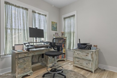 Located in the highly sought-after golf cart district of on Gulf Hills Golf Club in Mississippi - for sale on GolfHomes.com, golf home, golf lot