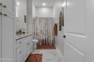 Located in the highly sought-after golf cart district of on Gulf Hills Golf Club in Mississippi - for sale on GolfHomes.com, golf home, golf lot