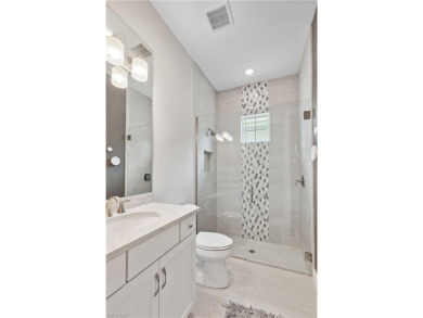 Discover the epitome of luxury living in this exceptional on The Golf Club At Fiddlers Creek in Florida - for sale on GolfHomes.com, golf home, golf lot