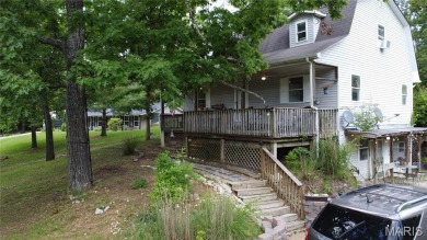 Welcome to the remarkable Terre Du Lac community! This spacious on Terre Du Lac Golf and Country Club in Missouri - for sale on GolfHomes.com, golf home, golf lot