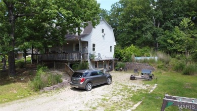 Welcome to the remarkable Terre Du Lac community! This spacious on Terre Du Lac Golf and Country Club in Missouri - for sale on GolfHomes.com, golf home, golf lot