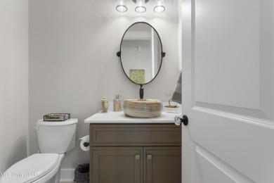 Located in the highly sought-after golf cart district of on Gulf Hills Golf Club in Mississippi - for sale on GolfHomes.com, golf home, golf lot