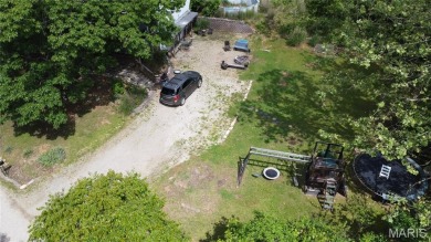 Welcome to the remarkable Terre Du Lac community! This spacious on Terre Du Lac Golf and Country Club in Missouri - for sale on GolfHomes.com, golf home, golf lot