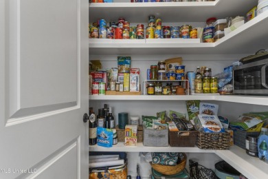 Located in the highly sought-after golf cart district of on Gulf Hills Golf Club in Mississippi - for sale on GolfHomes.com, golf home, golf lot