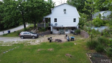 Welcome to the remarkable Terre Du Lac community! This spacious on Terre Du Lac Golf and Country Club in Missouri - for sale on GolfHomes.com, golf home, golf lot