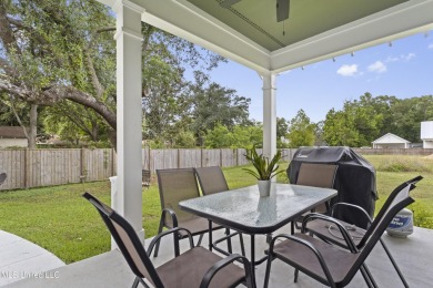 Located in the highly sought-after golf cart district of on Gulf Hills Golf Club in Mississippi - for sale on GolfHomes.com, golf home, golf lot