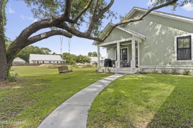 Located in the highly sought-after golf cart district of on Gulf Hills Golf Club in Mississippi - for sale on GolfHomes.com, golf home, golf lot