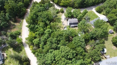 Welcome to the remarkable Terre Du Lac community! This spacious on Terre Du Lac Golf and Country Club in Missouri - for sale on GolfHomes.com, golf home, golf lot