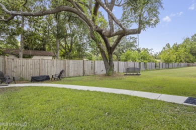 Located in the highly sought-after golf cart district of on Gulf Hills Golf Club in Mississippi - for sale on GolfHomes.com, golf home, golf lot