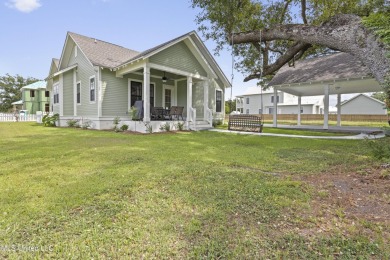 Located in the highly sought-after golf cart district of on Gulf Hills Golf Club in Mississippi - for sale on GolfHomes.com, golf home, golf lot