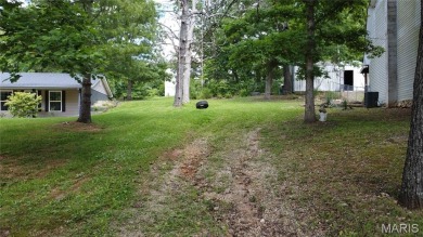 Welcome to the remarkable Terre Du Lac community! This spacious on Terre Du Lac Golf and Country Club in Missouri - for sale on GolfHomes.com, golf home, golf lot