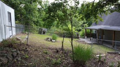 Welcome to the remarkable Terre Du Lac community! This spacious on Terre Du Lac Golf and Country Club in Missouri - for sale on GolfHomes.com, golf home, golf lot