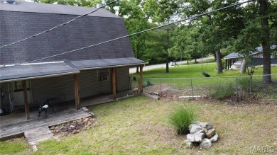 Welcome to the remarkable Terre Du Lac community! This spacious on Terre Du Lac Golf and Country Club in Missouri - for sale on GolfHomes.com, golf home, golf lot