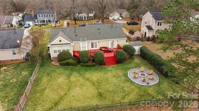 Welcome to 8615 Golf Ridge Drive, an updated ranch-style home on Raintree Country Club in North Carolina - for sale on GolfHomes.com, golf home, golf lot