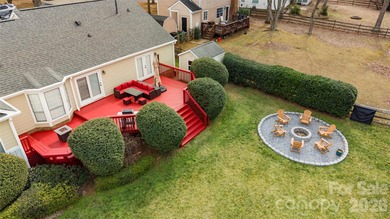 Welcome to 8615 Golf Ridge Drive, an updated ranch-style home on Raintree Country Club in North Carolina - for sale on GolfHomes.com, golf home, golf lot