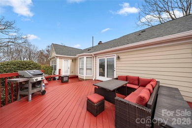 Welcome to 8615 Golf Ridge Drive, an updated ranch-style home on Raintree Country Club in North Carolina - for sale on GolfHomes.com, golf home, golf lot