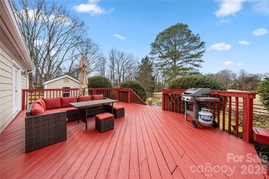 Welcome to 8615 Golf Ridge Drive, an updated ranch-style home on Raintree Country Club in North Carolina - for sale on GolfHomes.com, golf home, golf lot