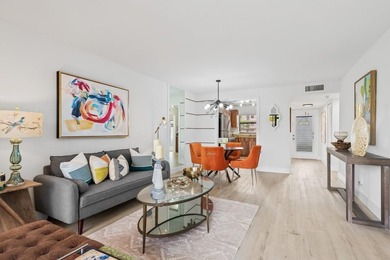 FULLY RENOVATED first-floor 2 bedroom/1.5 baths with screened on Sunrise Lakes Phase III in Florida - for sale on GolfHomes.com, golf home, golf lot