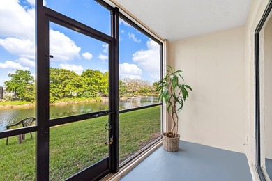 FULLY RENOVATED first-floor 2 bedroom/1.5 baths with screened on Sunrise Lakes Phase III in Florida - for sale on GolfHomes.com, golf home, golf lot