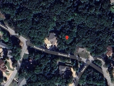 Buildable lot with water and sewer access steps from the on Bella Vista - Metfield Golf Complex and Country Club in Arkansas - for sale on GolfHomes.com, golf home, golf lot