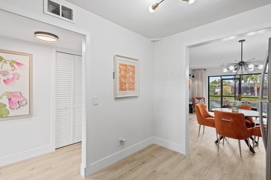 FULLY RENOVATED first-floor 2 bedroom/1.5 baths with screened on Sunrise Lakes Phase III in Florida - for sale on GolfHomes.com, golf home, golf lot