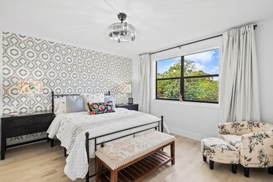 FULLY RENOVATED first-floor 2 bedroom/1.5 baths with screened on Sunrise Lakes Phase III in Florida - for sale on GolfHomes.com, golf home, golf lot