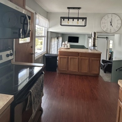 Experience effortless comfort the moment you step inside on Spring Meadows Country Club in Michigan - for sale on GolfHomes.com, golf home, golf lot