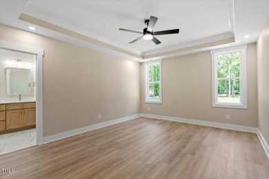 Welcome to this stunning new home nestled on a oversized .74 on Zebulon Country Club in North Carolina - for sale on GolfHomes.com, golf home, golf lot