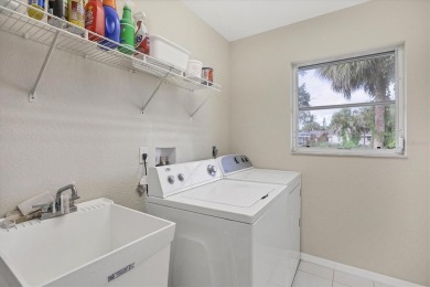 Welcome to your dream home nestled in the serene Rotonda West on Rotonda Golf and Country Club - Long Marsh  in Florida - for sale on GolfHomes.com, golf home, golf lot