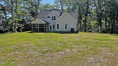 Welcome to this stunning new home nestled on a oversized .74 on Zebulon Country Club in North Carolina - for sale on GolfHomes.com, golf home, golf lot