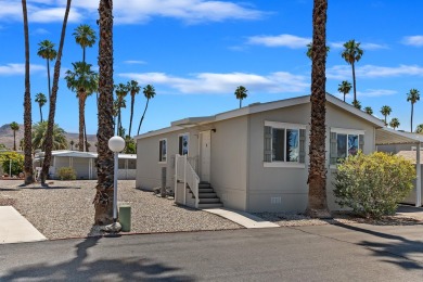 Discover resort-style living in the heart of Cathedral City's on Cathedral Canyon Golf and Tennis Club in California - for sale on GolfHomes.com, golf home, golf lot