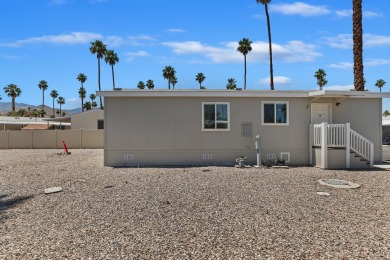 Discover resort-style living in the heart of Cathedral City's on Cathedral Canyon Golf and Tennis Club in California - for sale on GolfHomes.com, golf home, golf lot