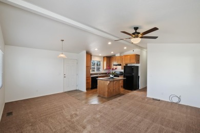 Discover resort-style living in the heart of Cathedral City's on Cathedral Canyon Golf and Tennis Club in California - for sale on GolfHomes.com, golf home, golf lot