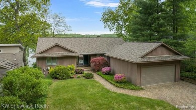 WONDERFUL RANCH HOME WITH LL WALK-OUT IS NESTLED AMONG THE TREES on Lakelands Golf and Country Club in Michigan - for sale on GolfHomes.com, golf home, golf lot