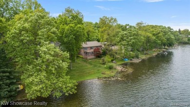 WONDERFUL RANCH HOME WITH LL WALK-OUT IS NESTLED AMONG THE TREES on Lakelands Golf and Country Club in Michigan - for sale on GolfHomes.com, golf home, golf lot