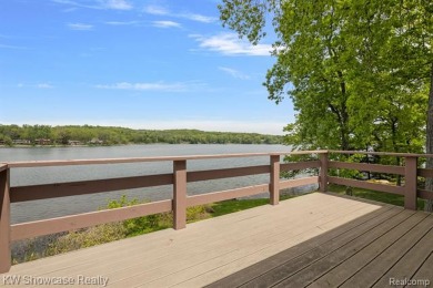 WONDERFUL RANCH HOME WITH LL WALK-OUT IS NESTLED AMONG THE TREES on Lakelands Golf and Country Club in Michigan - for sale on GolfHomes.com, golf home, golf lot