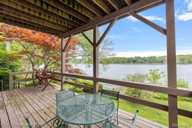 WONDERFUL RANCH HOME WITH LL WALK-OUT IS NESTLED AMONG THE TREES on Lakelands Golf and Country Club in Michigan - for sale on GolfHomes.com, golf home, golf lot